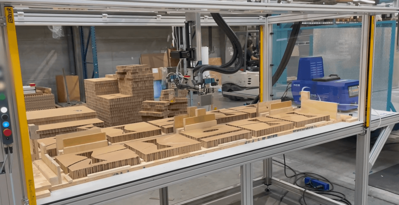 Gantry robot for gluing corrugated crests together